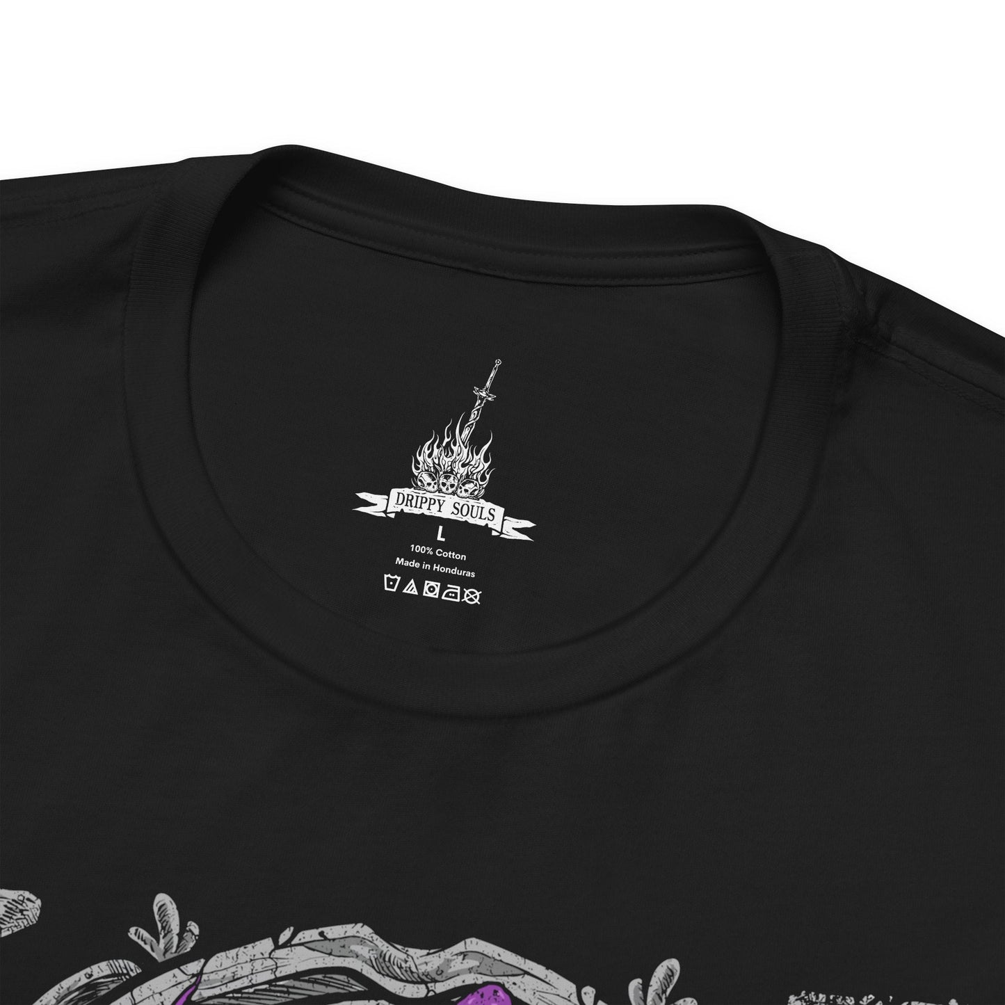 Folded T-shirt design of Artorias of the Abyss, the fallen knight of Gwyn, standing amid swirling darkness as the Abyss consumes his once-glorious armor. His massive greatsword drags across the ground, one arm shattered while black corruption coils around him, reflecting his tragic sacrifice to halt the spread of the Abyss and protect Oolacile.