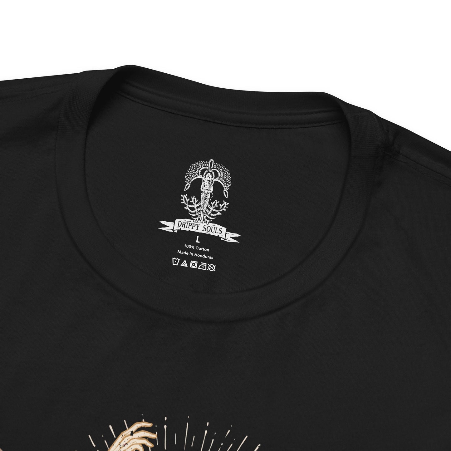 Folded T-shirt design of Consort Radahn and Miquella from Elden Ring, depicting the fallen Starscourge bound in death and devotion to the Empyrean Miquella. Radahn’s colossal, scarred form stands beneath a fractured sky while Miquella’s gentle yet ominous presence looms above, symbolizing manipulation, sacrifice, and the twisted bond forged beyond the Golden Order.