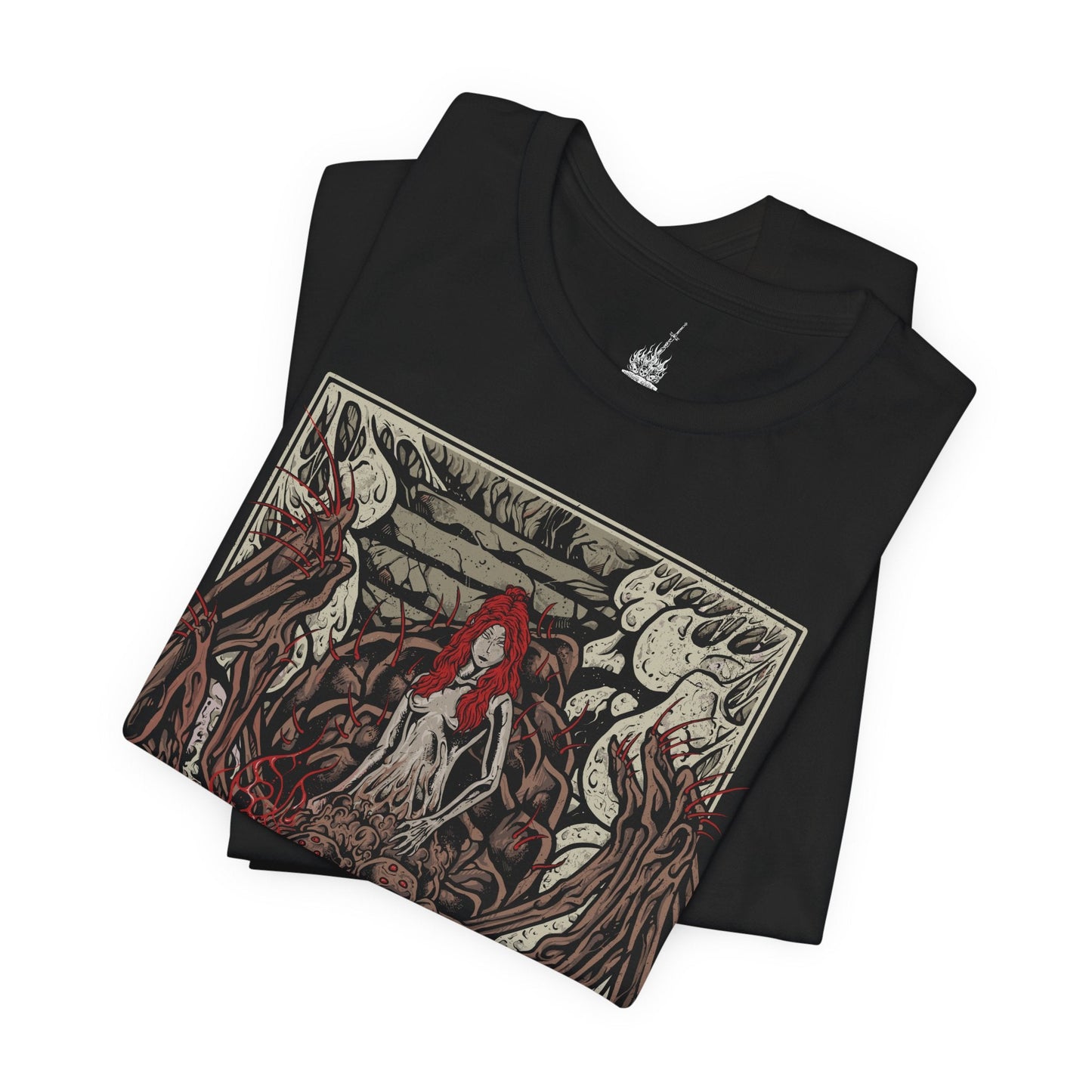 Folded T-shirt featuring Chaos Witch Quelaag from Dark Souls, the fearsome half-woman, half-spider guardian of Blighttown. Twisted by the Chaos Flame, she protects her sister while luring unwary Undead into her lair of fire and poison. This design captures her haunting fusion of beauty and monstrosity, a symbol of sacrifice and corruption.