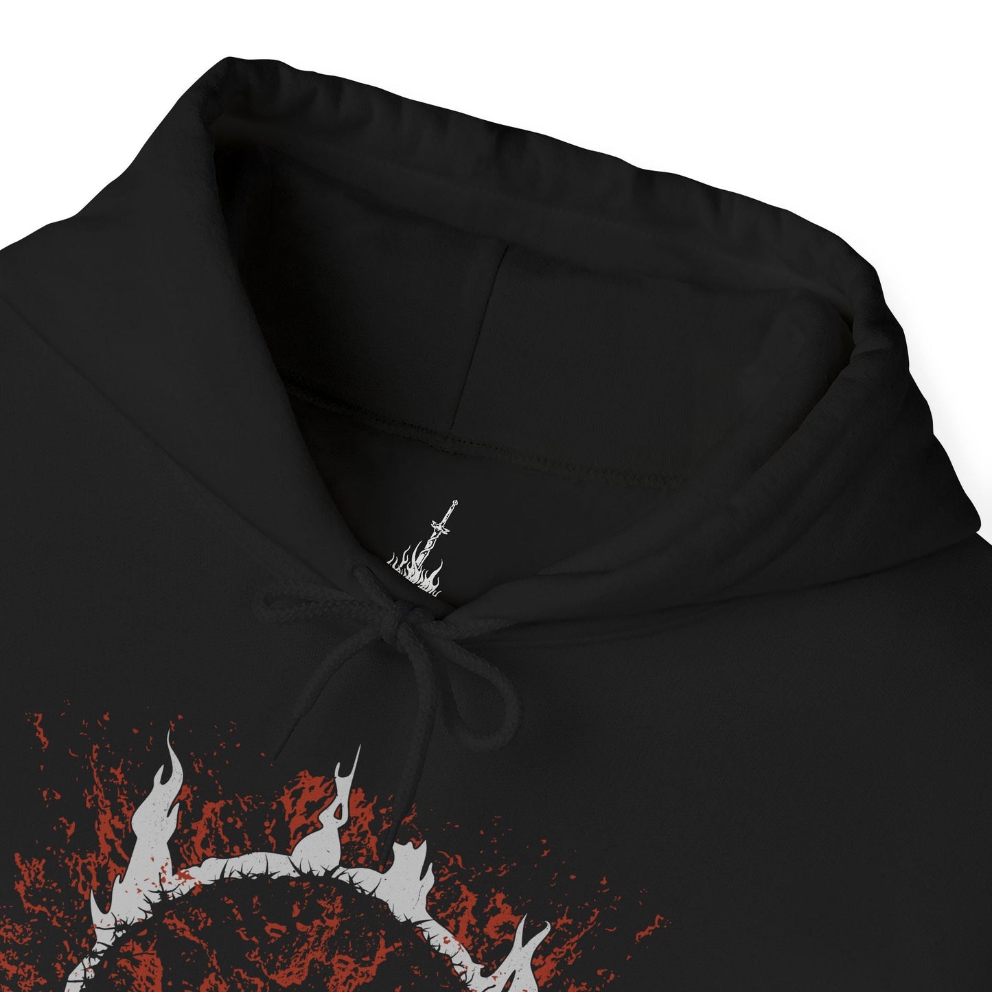 Folded Hooded Sweatshirt showcasing Gwyn, Lord of Cinder from Dark Souls, the fallen deity who founded the Age of Fire. His majestic armor scorched and his glory reduced to embers, Gwyn stands as a husk of his former self—still guarding the flame he once kindled. With his burning greatsword and regal yet broken posture, this design reflects the sacrifice and sorrow that define one of the game’s most pivotal and emotional final encounters.