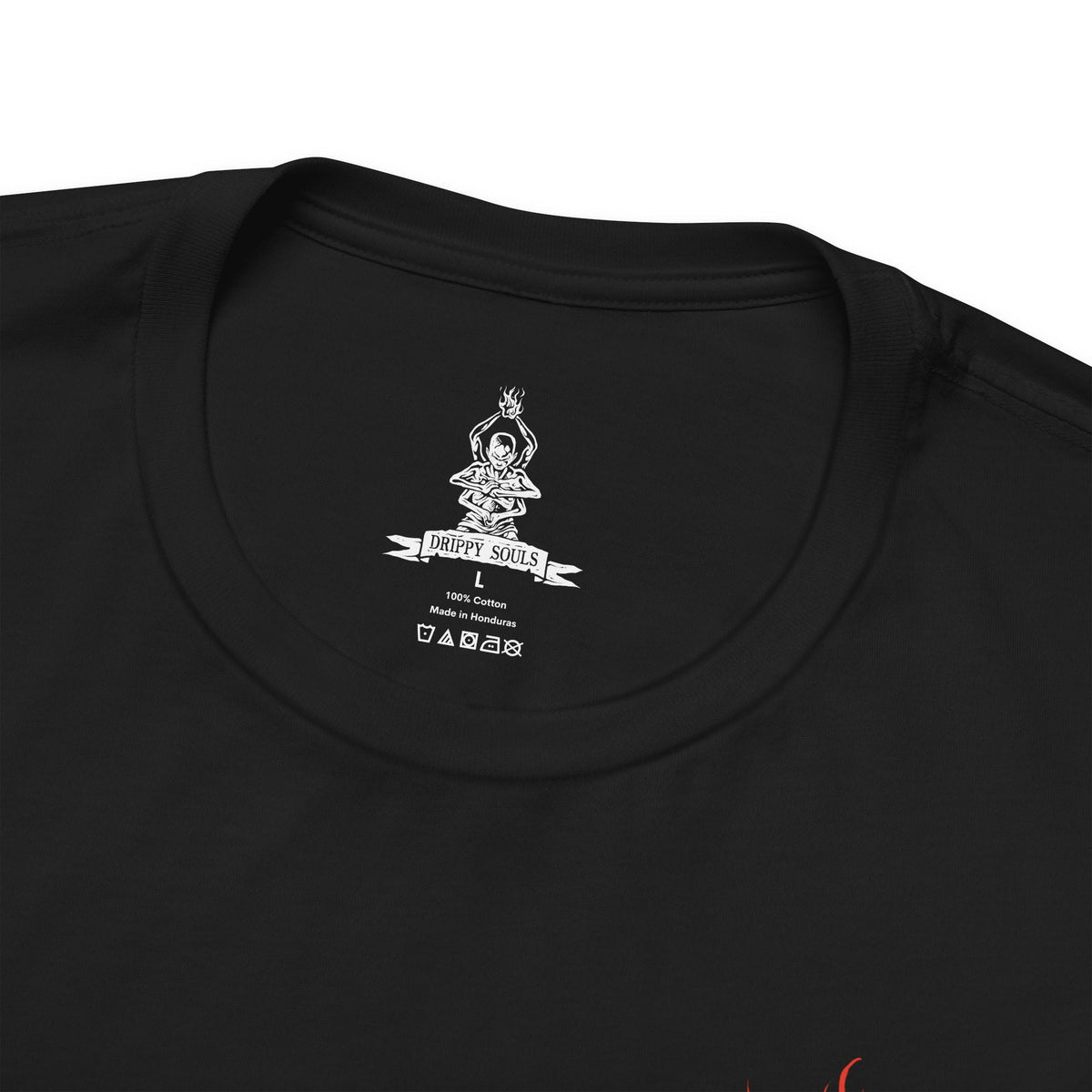 Folded T-shirt artwork depicting the Sculptor’s final transformation into the Demon of Hatred, his body engulfed in hellish fire as hatred manifests into monstrous form. Ash and sparks swirl through ruined battlefields while Buddha statues crumble nearby. This design reflects the inner torment of a warrior who failed to escape bloodshed, showing how unresolved rage births something far worse than death.