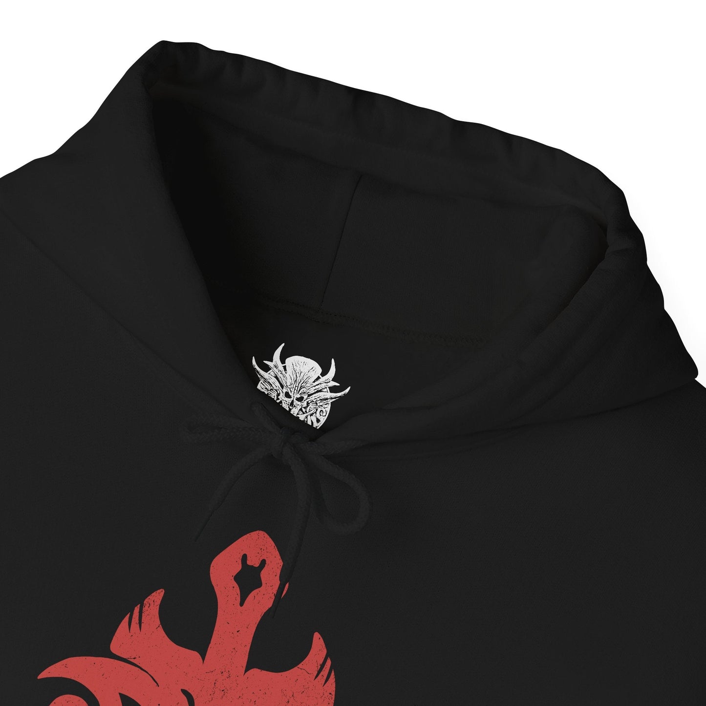 Folded Hooded Sweatshirt of Karlach unleashing the fiery power of her infernal heart, flames roaring around her as she stands victorious in a storm of ash and sparks. The infernal engine embedded in her chest radiates heat and light, symbolizing both curse and power. The composition emphasizes survival, rebellion, and the burning determination of the Fury of Avernus.