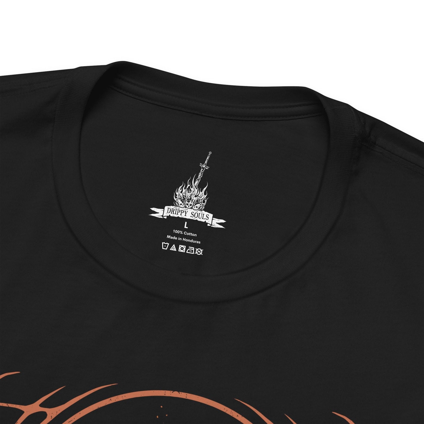 Folded T-shirt design of the Soul of Cinder from Dark Souls III, standing amid the Kiln of the First Flame as ash swirls through a dying sky. Its armor burns with embers while shifting stances reflect the countless Lords of Cinder who linked the fire before. The design captures the culmination of the Age of Fire, embodying every warrior who sacrificed themselves to prolong a fading world.