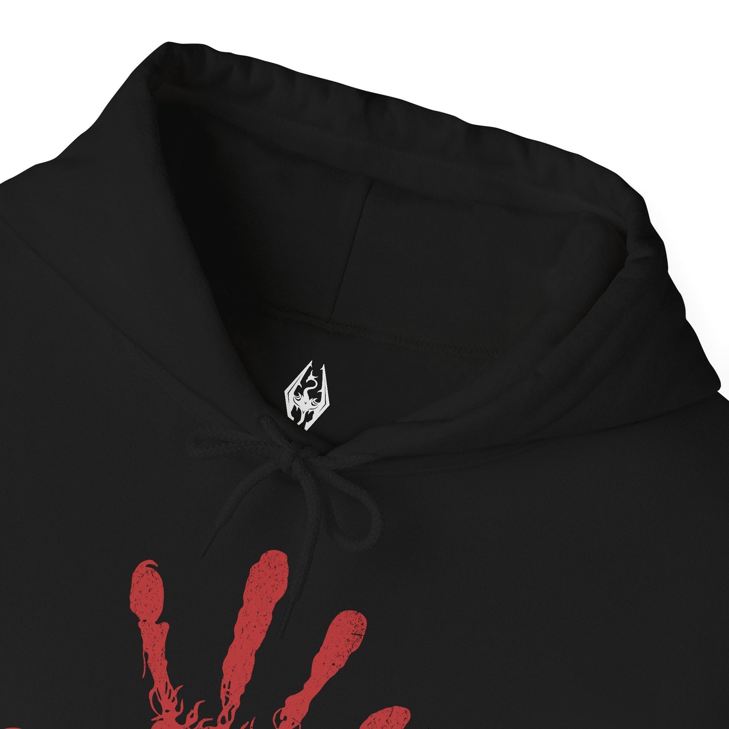 Folded Hooded Sweatshirt inspired by the Dark Brotherhood of Skyrim, depicting the crimson hand of the assassins who strike unseen and unheard. Bound by dark ritual and the will of Sithis, they move through Tamriel’s shadows, offering the Black Sacrament to those who seek vengeance. A perfect tribute to the mysterious killers who live by the words, “Sweet Mother, send your child unto me.”