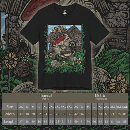 Size chart of a T-Shirt artwork depicting Alexander the Warrior Jar resting among the tranquil gardens of Jarburg, surrounded by colorful flowers, smaller Living Jars, and lush vegetation. Despite his imposing warrior reputation, the peaceful setting reveals a gentler side of the famous jar warrior. This design reflects Alexander's love of battle, his determination to grow stronger, and his unforgettable journey across the Lands Between.