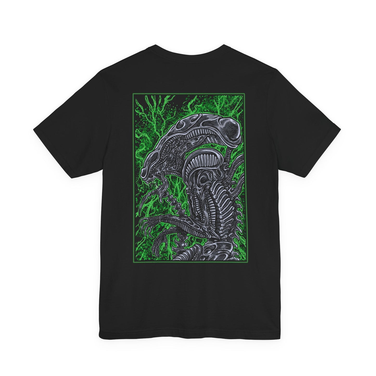 Image 5 of a T-Shirt artwork depicting a Xenomorph stalking through a dark spaceship corridor, steam rising from vents as its skeletal body blends into the environment. Its tail coils behind it while dim red lights flicker across metallic walls. This design reflects survival horror at its peak, emphasizing stealth, fear, and the relentless nature of one of cinema’s most iconic monsters.