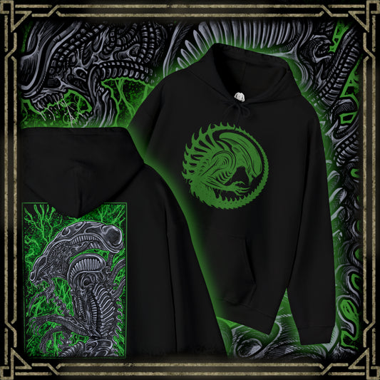 Thumbnail of a Hooded Sweatshirt of a Xenomorph standing over its prey in a dimly lit chamber, its glossy exoskeleton reflecting harsh industrial lighting. Shadows stretch across the floor as its elongated skull tilts forward, ready to attack. The composition emphasizes isolation, terror, and the unstoppable instinct of a creature designed purely for survival and dominance.