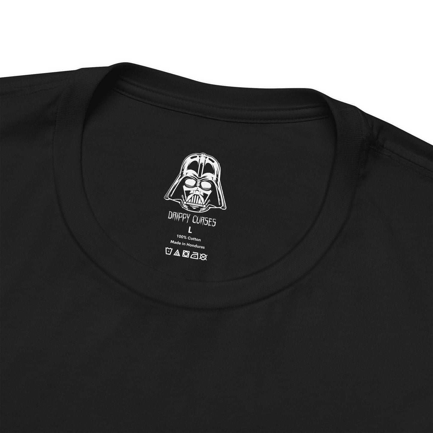 Folded T-Shirt artwork depicting Anakin Skywalker transitioning into Darth Vader, with flames and darkness consuming the scene as his Jedi robes fade into black armor. The glow of a lightsaber shifts from blue to red, reflecting his descent into the dark side. This design emphasizes betrayal, loss, and the emotional weight behind one of the most iconic character arcs in film history.