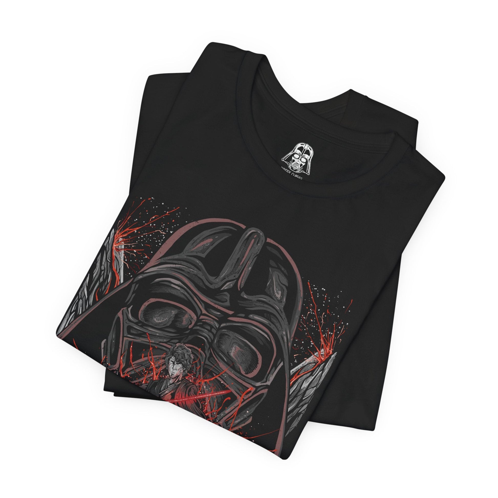 Image 5 of a T-Shirt design of Anakin Skywalker and Darth Vader from Star Wars, standing divided by light and shadow as blue and red lightsabers glow against a darkened battlefield. Anakin’s determined gaze contrasts with Vader’s imposing armored form, symbolizing the tragic fall of a hero. The design captures the transformation, inner conflict, and destiny that reshaped the galaxy.
