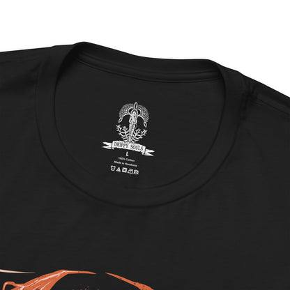 Folded T-Shirt design of Bayle the Dread from Elden Ring: Shadow of the Erdtree, towering atop the Jagged Peak as crimson lightning erupts around his scarred draconic body. Torn wings and shattered horns reveal the brutal wounds left by his ancient war with Dragonlord Placidusax. The design captures Bayle's overwhelming fury, legendary resilience, and the savage hatred that made him one of the most feared ancient dragons.