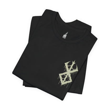 Folded T-shirt featuring the Beast of Darkness from Berserk, the monstrous manifestation of Guts’ rage, grief, and trauma. Shaped like a demonic wolf cloaked in shadow, the Beast whispers bloodlust into Guts’ mind, urging him toward destruction. This design captures its feral snarl and glowing eyes—a haunting symbol of inner torment and the fight to retain humanity.