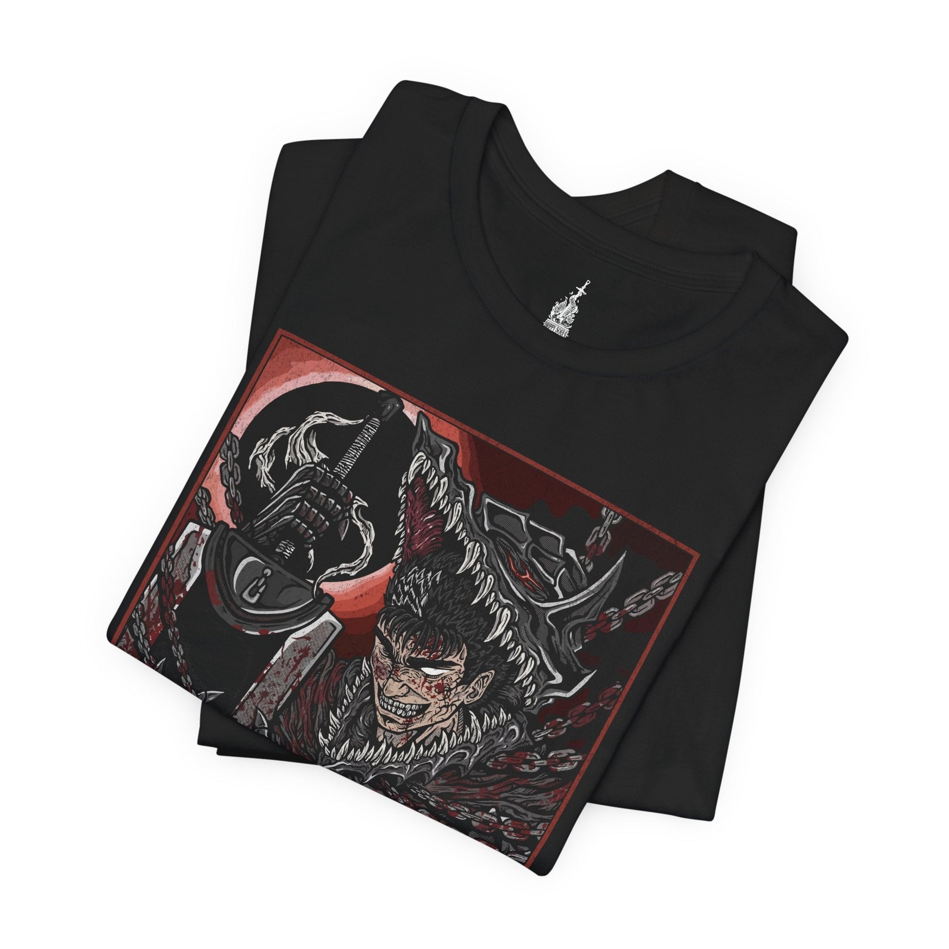 Folded T-shirt featuring Guts from Berserk in a state of rage, wearing his iconic Berserker Armor, captured in a grim and intense design, perfect for fans who admire the raw power and fury of the Black Swordsman.