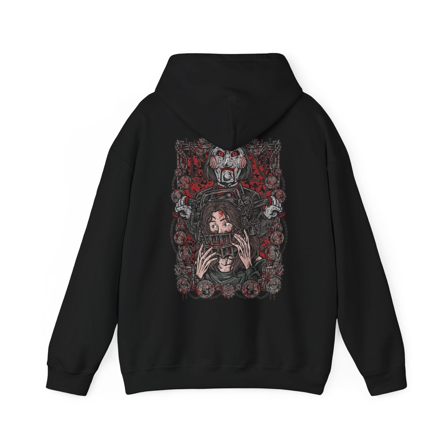 Image 5 of a Hooded Sweatshirt of Billy the Puppet staring forward with a sinister grin, his black suit and red bow tie framed by chains, gears, and rusted metal. A dim industrial setting fades behind him as ominous red light highlights his face. The composition emphasizes psychological tension, horror, and the iconic image of the puppet who announces Jigsaw’s deadly games.