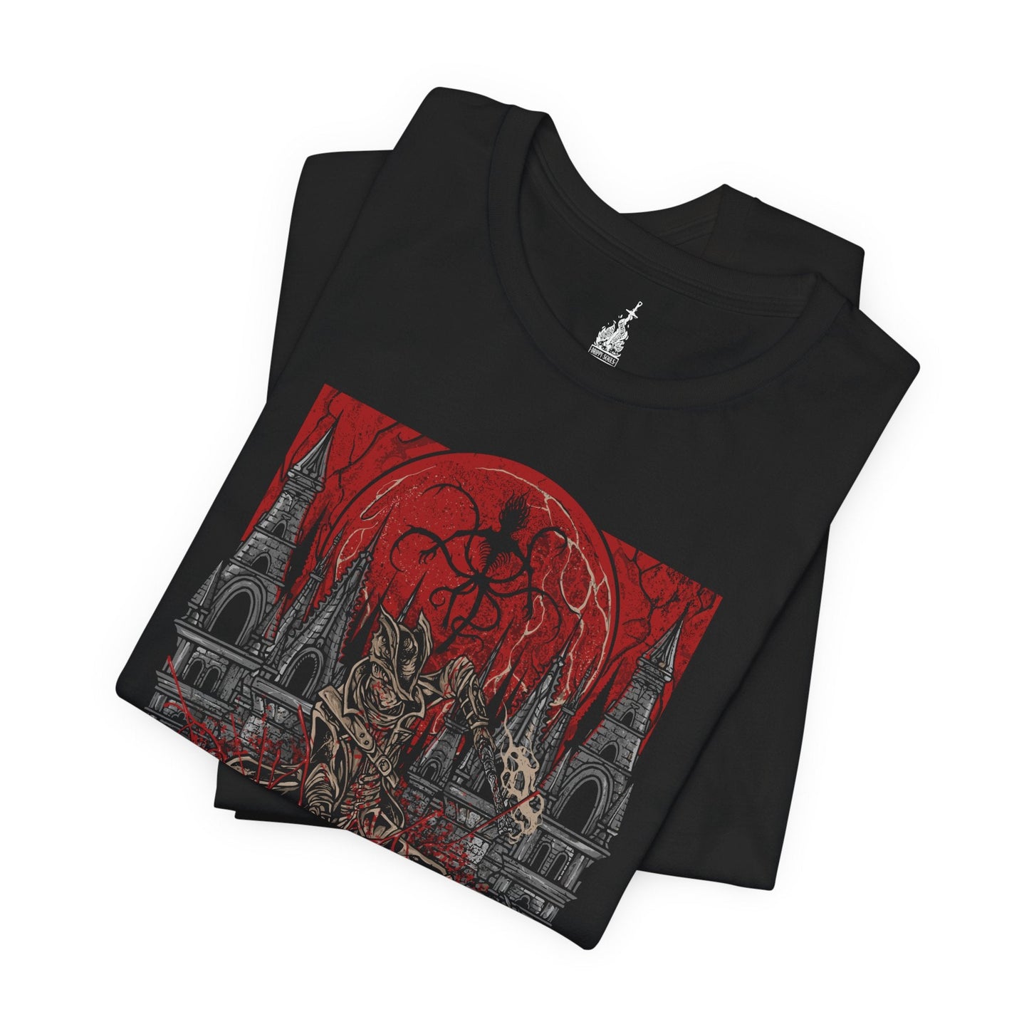 Folded T-shirt featuring a Hunter of Yharnam from Bloodborne, poised beneath a blood moon on the Night of the Hunt. Cloaked in gothic attire and armed with a trick weapon, the Hunter stalks the streets of Yharnam, battling beasts and madness alike. This design captures the eerie, violent elegance of the hunt’s grim ritual.