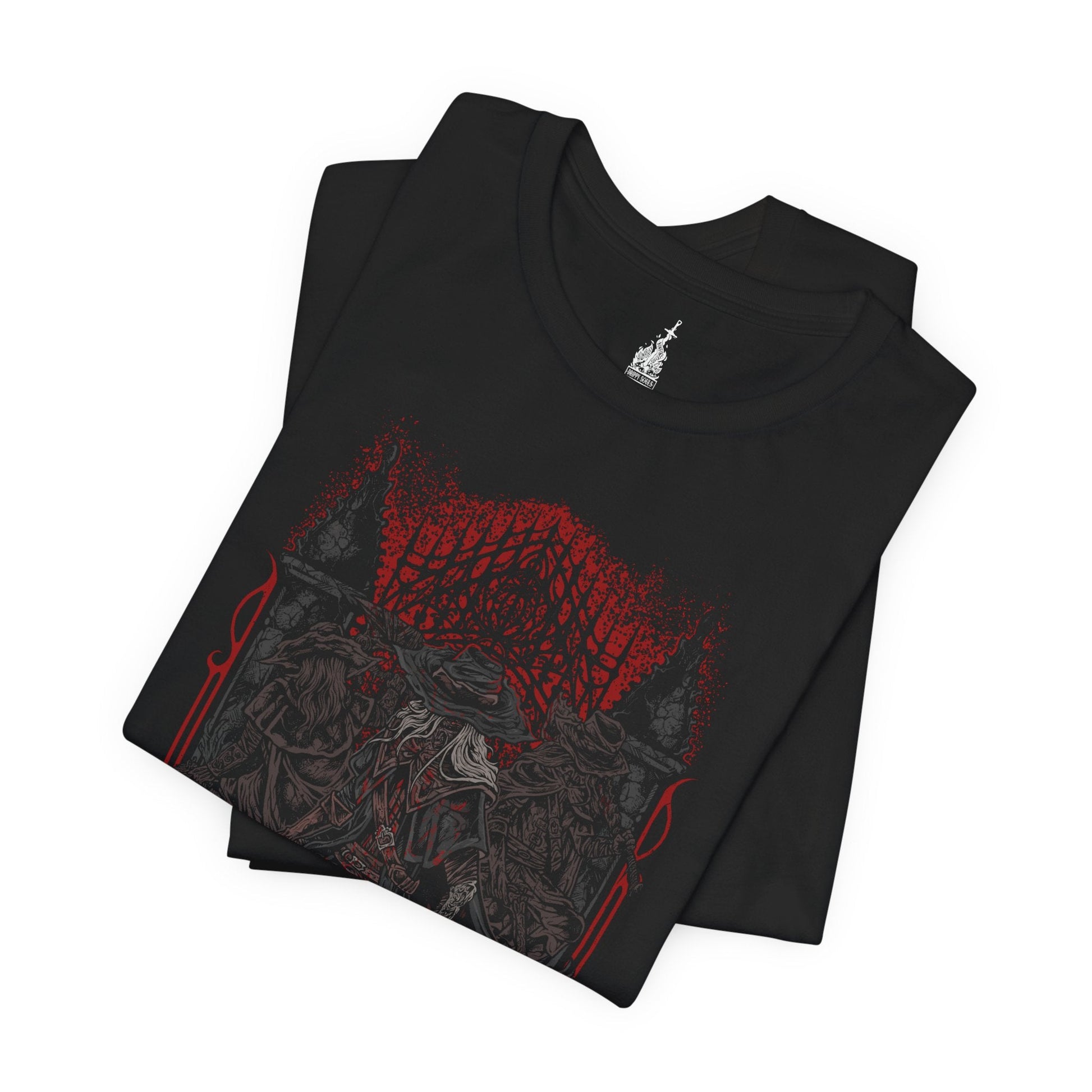 Folded T-shirt featuring the First Old Hunters from Bloodborne, the legendary pioneers of the Hunt who faced the beasts before the Healing Church refined its craft. Bound by blood and tragedy, these hunters carved their legacy in Yharnam with saws, blades, and trick weapons. This design captures the grim brotherhood who became both heroes and victims of the scourge.