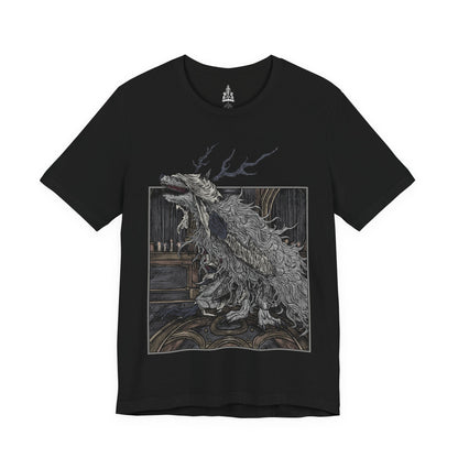 Image 4 of a T-shirt featuring Vicar Amelia from Bloodborne, the once-devout leader of the Healing Church transformed into a towering beast of fur and sinew. Clutching a sacred pendant in her grotesque paws, Amelia symbolizes the church’s descent into corruption. This design captures her dramatic shift from cleric to monster, framed in gothic horror and divine tragedy under the pale moonlight.