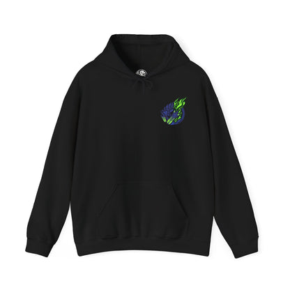 Image 4 of a Hooded Sweatshirt of Brachydios standing amid a crater filled with smoke and burning debris, luminous green slime dripping from its horn and forearms as it prepares another crushing attack. Volcanic ash darkens the sky while explosions illuminate the battlefield. The composition emphasizes destructive power, explosive energy, and the iconic presence of one of Monster Hunter’s most formidable brute wyverns.