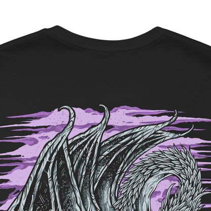 Image 7 of a T-Shirt artwork depicting Caligo, Miasma of Night descending upon a frozen battlefield, exhaling a devastating torrent of icy breath that blankets the land in frost and shadow. Dark clouds and spectral snow swirl around the ancient dragon as crystalline ice engulfs ruined structures below. This design reflects Caligo's overwhelming dominion over cold, darkness, and the relentless corruption spreading through the world of Elden Ring Nightreign.