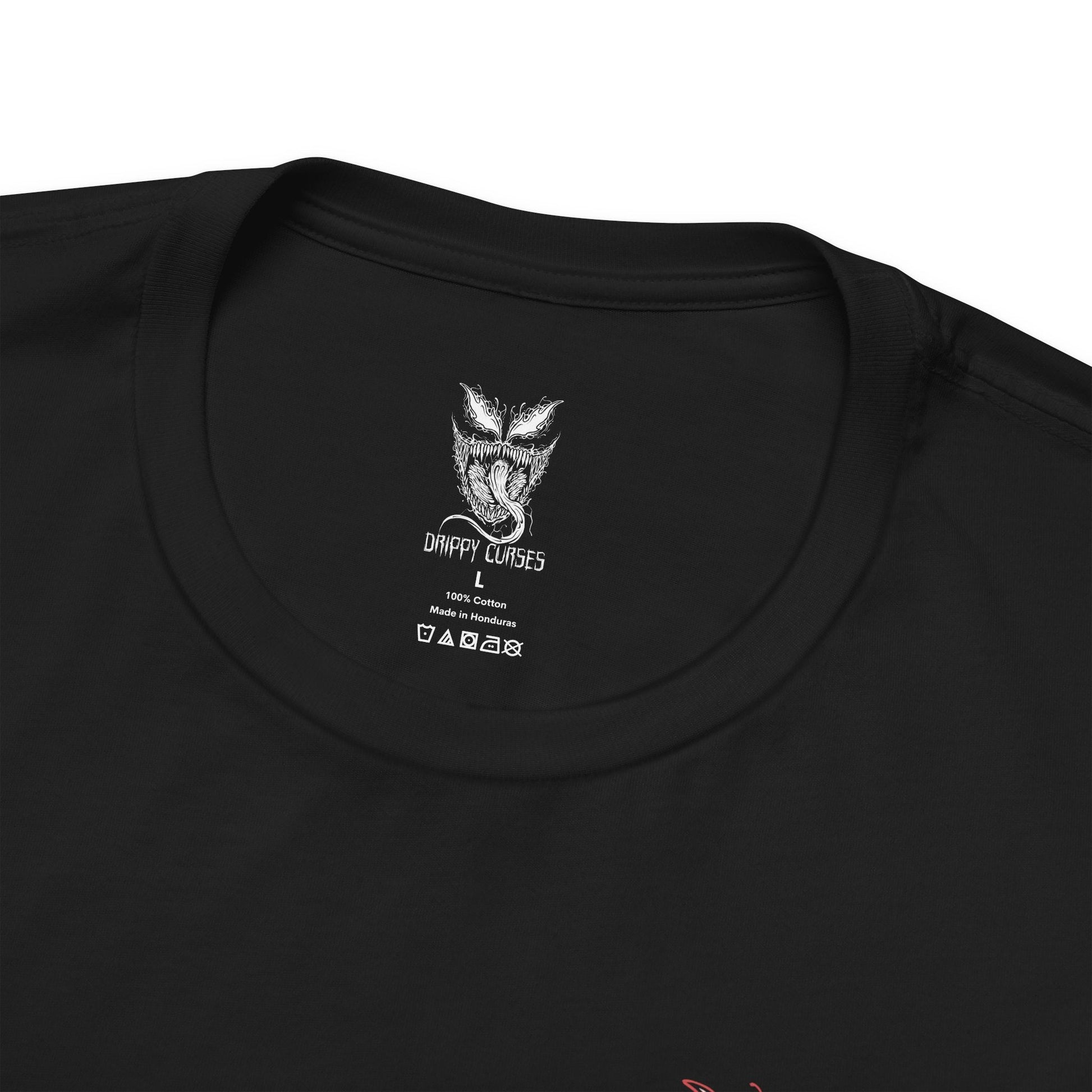 Folded T-Shirt artwork depicting Carnage lunging forward through a storm of blood-red symbiote tendrils, claws extended as the ground fractures beneath him. Black and crimson textures ripple across his body while sharp appendages form from living organic matter. This design reflects uncontrollable brutality, psychotic energy, and the savage nature of one of Marvel’s most dangerous symbiotes.