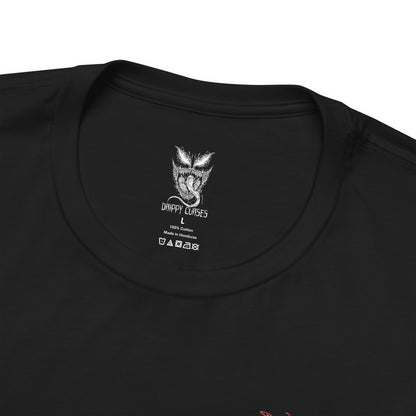 Folded T-Shirt artwork depicting Carnage lunging forward through a storm of blood-red symbiote tendrils, claws extended as the ground fractures beneath him. Black and crimson textures ripple across his body while sharp appendages form from living organic matter. This design reflects uncontrollable brutality, psychotic energy, and the savage nature of one of Marvel’s most dangerous symbiotes.