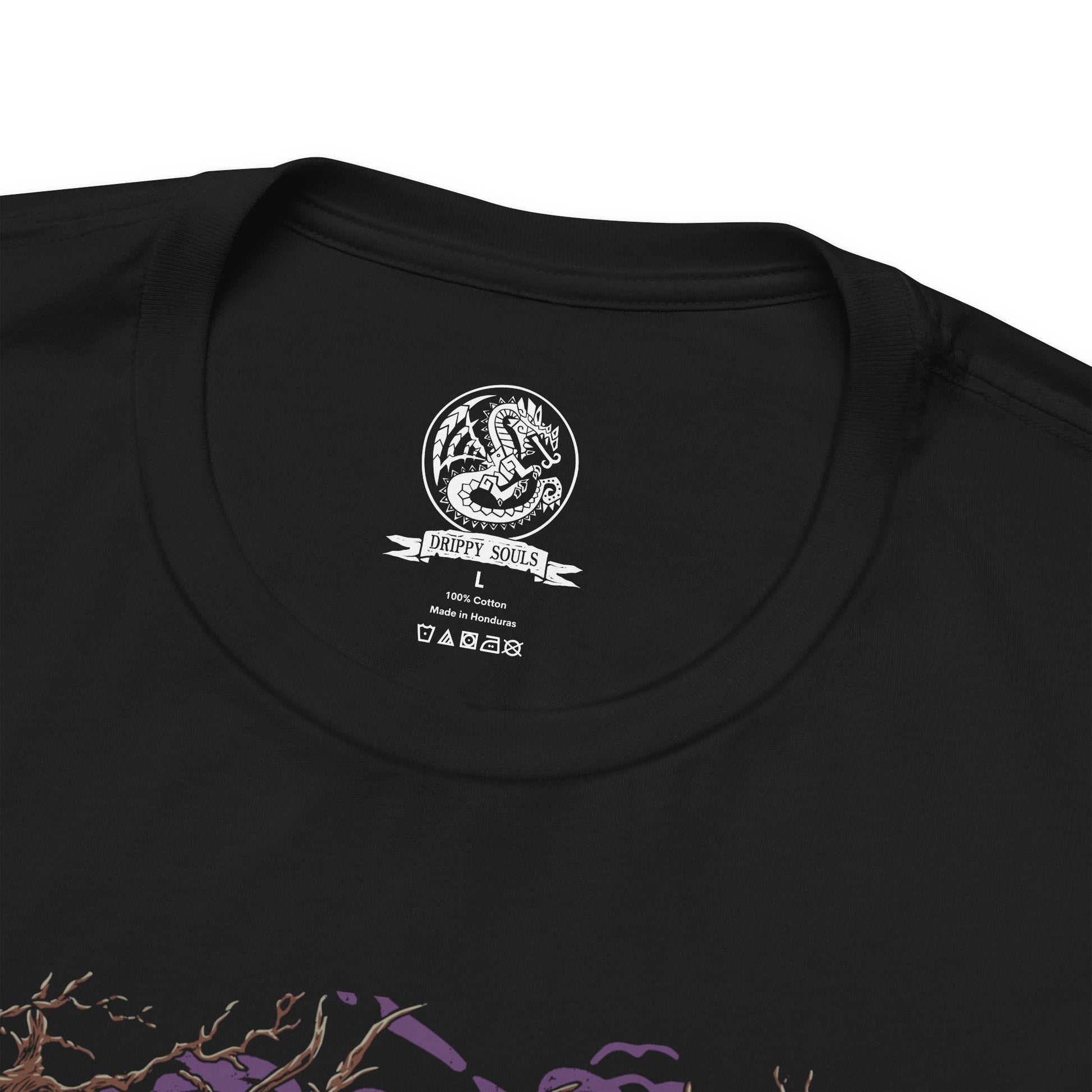 Folded T-Shirt design of Chameleos from Monster Hunter, the mysterious Elder Dragon emerging from a dense forest mist as its iridescent scales shimmer between green, purple, and blue. Toxic vapor coils around its massive body while its long tongue reaches through the fog. The design captures Chameleos' mastery of camouflage, poison, and deception, embodying the elusive nature of one of Monster Hunter's most enigmatic Elder Dragons.