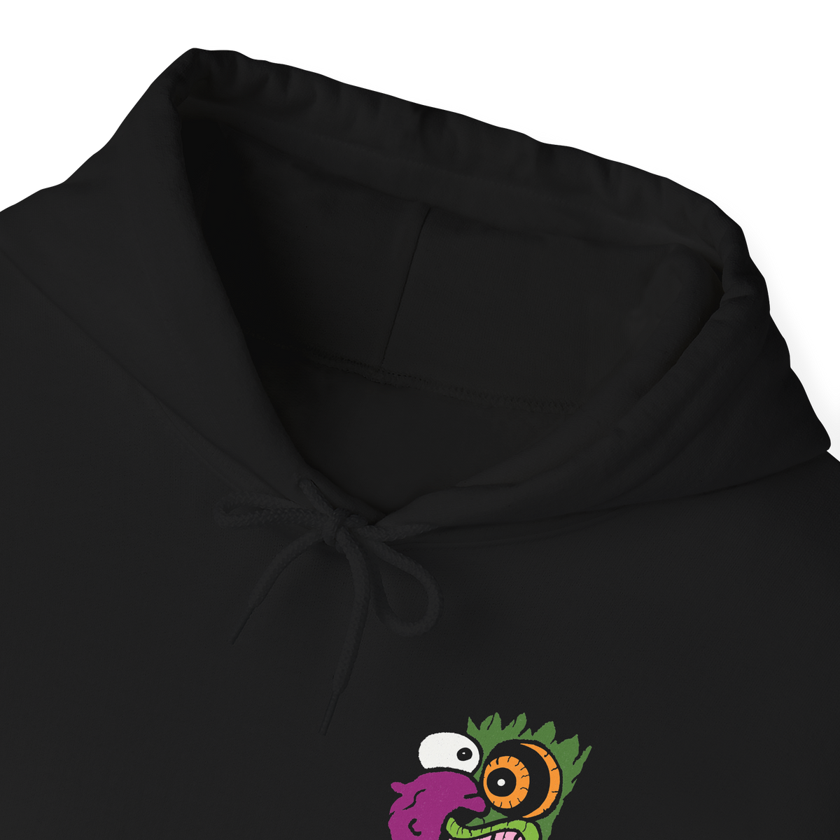 Folded Hooded Sweatshirt design of Eustace Bagge wearing the iconic creepy mask from Courage the Cowardly Dog, featuring its exaggerated face and unsettling grin against a dark, nostalgic cartoon-inspired backdrop. The artwork captures the bizarre humor and eerie atmosphere of the classic animated series, referencing Eustace's infamous Ooga Booga scare routine. A striking design for fans of Courage, retro Cartoon Network shows, and creepy cartoon nostalgia.