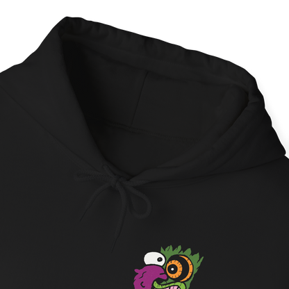 Folded Hooded Sweatshirt design of Eustace Bagge wearing the iconic creepy mask from Courage the Cowardly Dog, featuring its exaggerated face and unsettling grin against a dark, nostalgic cartoon-inspired backdrop. The artwork captures the bizarre humor and eerie atmosphere of the classic animated series, referencing Eustace's infamous Ooga Booga scare routine. A striking design for fans of Courage, retro Cartoon Network shows, and creepy cartoon nostalgia.