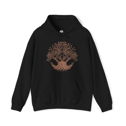 Image 4 of a Hooded Sweatshirt of Crucible Knight Ordovis standing beneath the roots of the ancient Erdtree, his ornate Golden Crucible Tree armor illuminated by radiant golden light. Ordovis grips his massive greatsword as swirling Crucible energy gathers around his armored body and ancient stone surrounds the battlefield. The composition emphasizes his imposing presence, sacred heritage, and connection to the primordial Crucible.