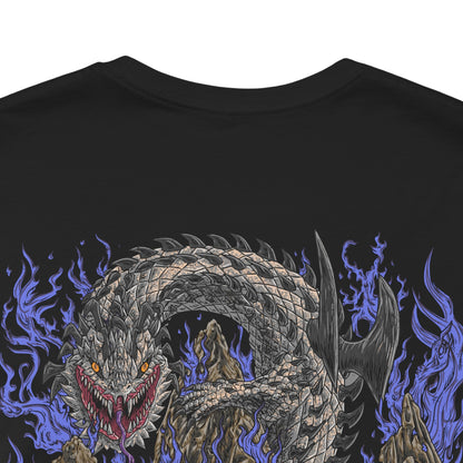 Image 7 of a T-Shirt artwork depicting Dalamadur twisting its enormous serpentine body around a jagged mountain while hunters battle across its scales below. The Elder Dragon's massive head emerges from the darkness with its jaws open, revealing enormous fangs as poisonous energy gathers around its mouth. Storm clouds, cliffs, and scattered hunters emphasize the creature's overwhelming size.