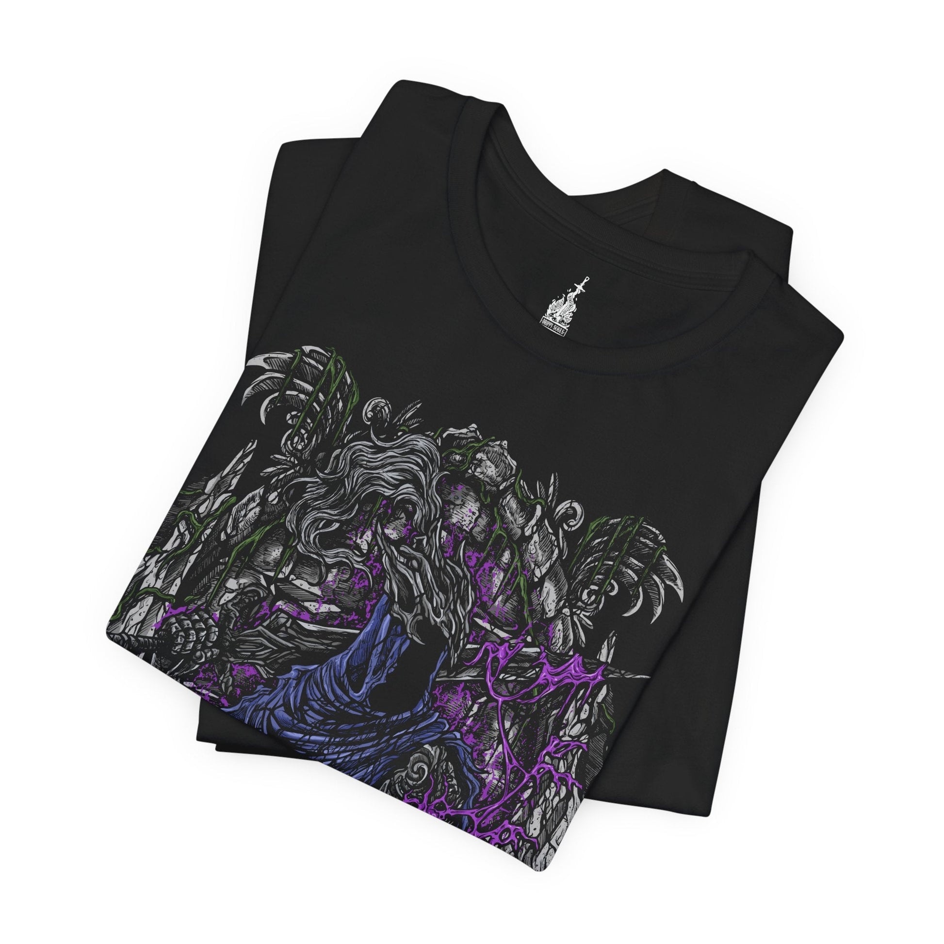 Folded T-shirt featuring Artorias the Abysswalker from Dark Souls, the fallen knight who dared to challenge the Abyss alone. Once a noble warrior and one of Gwyn’s Four Knights, Artorias became corrupted in his doomed quest to save Oolacile. This design captures his shattered arm, tattered cape, and relentless stance—honoring his tragic sacrifice and unbreakable will in the face of eternal darkness.
