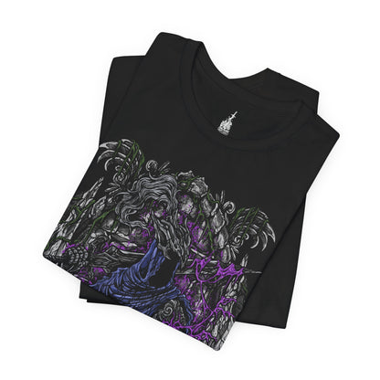 Folded T-shirt featuring Artorias the Abysswalker from Dark Souls, the fallen knight who dared to challenge the Abyss alone. Once a noble warrior and one of Gwyn’s Four Knights, Artorias became corrupted in his doomed quest to save Oolacile. This design captures his shattered arm, tattered cape, and relentless stance—honoring his tragic sacrifice and unbreakable will in the face of eternal darkness.