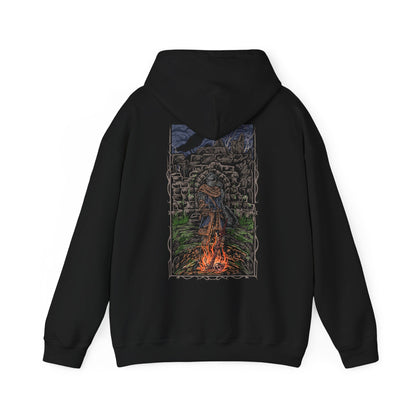 Image 5 of a Dark Souls Hooded Sweatshirt featuring the Chosen Undead at Firelink Shrine, the haunting sanctuary where journeys begin and legends end. With its hollowed architecture and ever-burning flame, the shrine stands as both home and reminder of destiny. This design honors the cursed warrior’s role in shaping the Age of Fire and beyond.