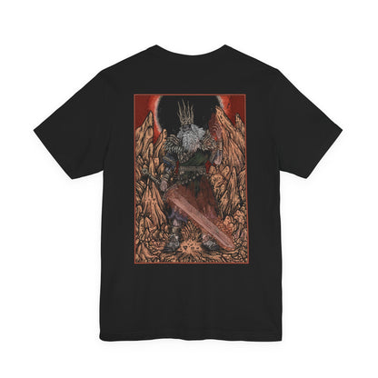 Image 4 of a T-shirt featuring Gwyn, Lord of Cinder from Dark Souls, the once-mighty god who linked the First Flame to prolong the Age of Fire. Now a hollowed husk, Gwyn wields a flaming greatsword in a final act of sacrifice. This design captures the solemn tragedy of his fall from divine king to fading ember in the Kiln.