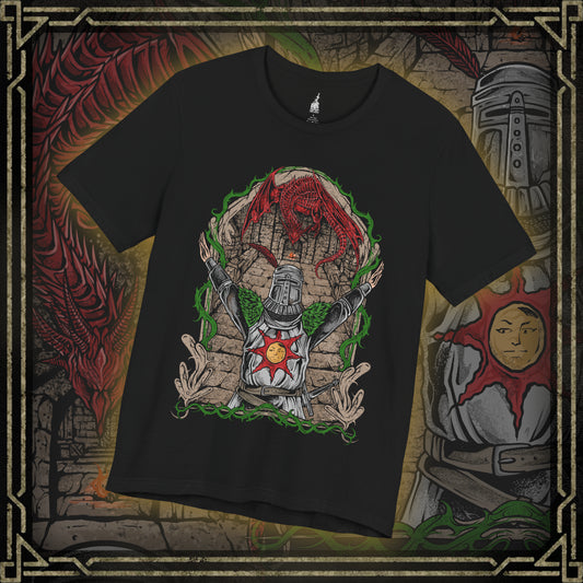 Thumbnail of a T-shirt featuring Solaire of Astora from Dark Souls, the ever-optimistic warrior whose quest for the sun mirrors humanity’s search for purpose. His devotion and courage stand against the curse of the Undead. This design celebrates his legendary “Praise the Sun” gesture and his enduring legacy as one of gaming’s most inspiring figures.