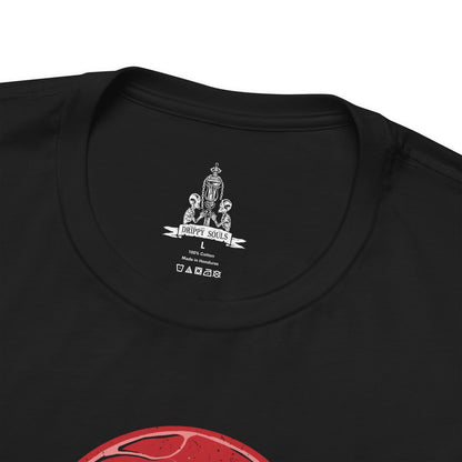 Folded T-Shirt design of Eileen the Crow from Bloodborne, standing beneath a blood-red moon with her plague doctor mask and feathered cloak shrouded in shadow. She grips the Blade of Mercy while crows scatter across the rooftops of Yharnam behind her. The design captures the mystery of the Hunter of Hunters, embodying mercy, death, and the burden of ending those consumed by bloodlust.