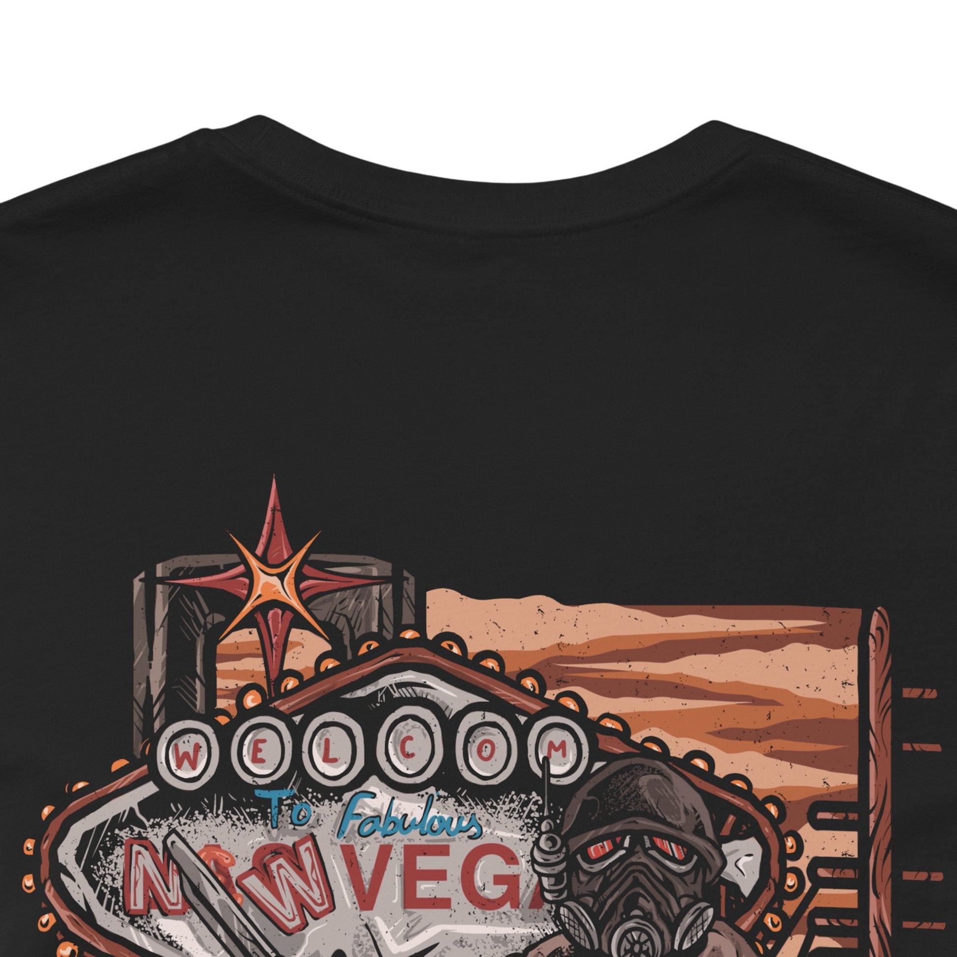 Image 7 of a T-Shirt artwork depicting an NCR Veteran Ranger overlooking the Mojave Wasteland from a rocky overlook, with the New Vegas Strip glowing in the distance. Dust storms sweep across abandoned highways while the ranger's signature helmet reflects the fading sunlight. This design reflects justice, survival, and the harsh realities of protecting civilization on the edge of a nuclear wasteland.