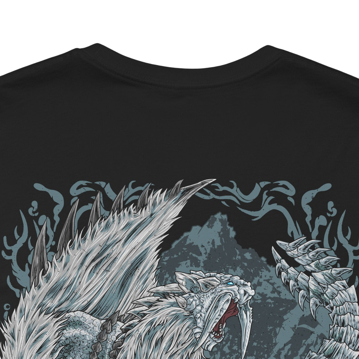 Image 7 of a Double-sided T-Shirt artwork featuring Frostfang Barioth from Monster Hunter World: Iceborne, depicting the massive ice-armored wyvern with elongated frozen tusks, sharp claws, and enormous wings. Snow swirls around its muscular body as icy vapor escapes its jaws, creating a dramatic portrait of this formidable predator. The design emphasizes its frozen adaptations, aggressive nature, and reputation as a terrifying challenge for experienced Monster Hunter hunters.