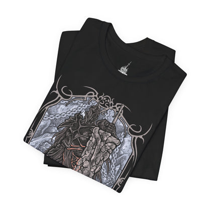 Image 5 of a T-shirt design of the Fume Knight from Dark Souls II, standing within the smoldering ruins of Brume Tower as ash drifts through the air. His massive ultra greatsword burns with dark flame while his corrupted armor radiates abyssal energy. The design captures Raime’s fall from loyal knight to forsaken warrior, consumed by hatred and bound to the Iron King’s cursed domain.