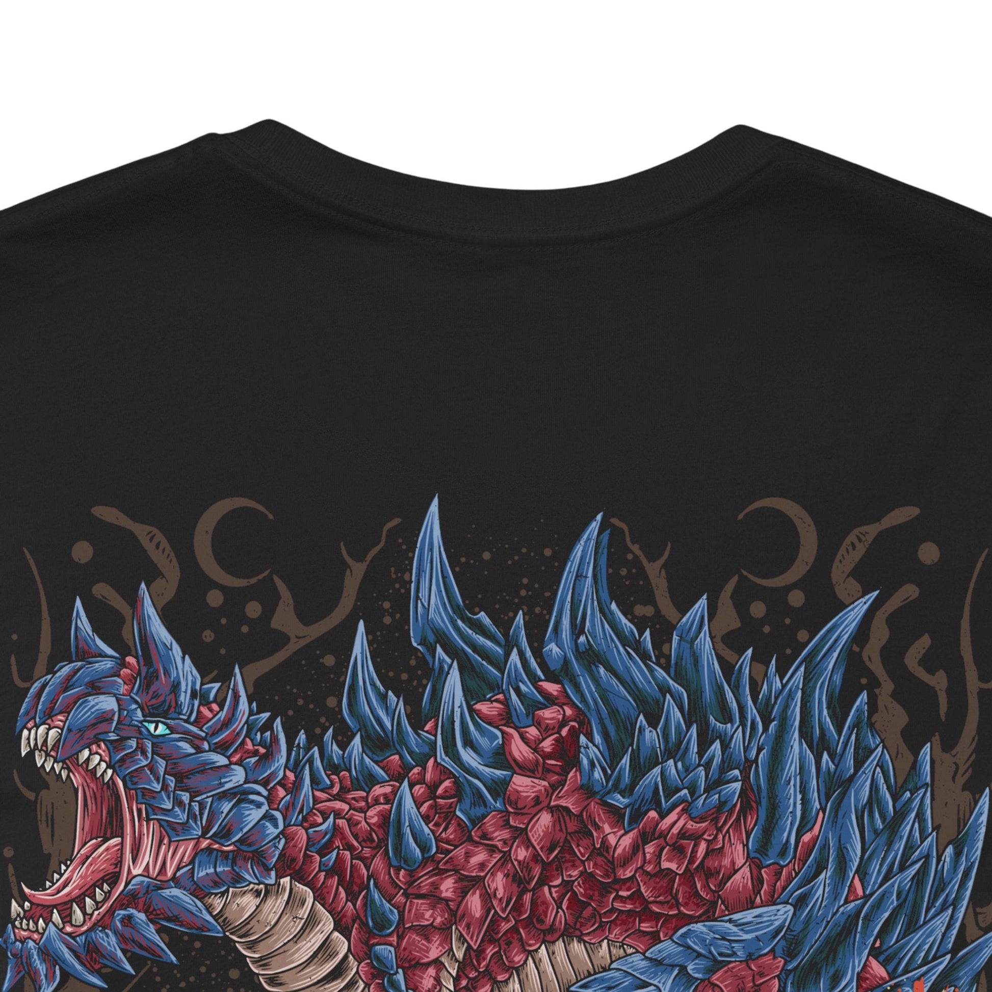 Image 7 of a T-Shirt artwork depicting Glavenus dragging its colossal blade tail across rocky terrain, igniting the earth as blazing embers and smoke trail behind each movement. Its armored crimson scales shimmer beneath the heat while towering cliffs frame the battlefield. This design reflects Glavenus' mastery of fiery melee combat, combining brute force, calculated strikes, and relentless aggression against any hunter that dares challenge it.