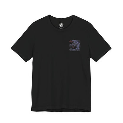 Image 4 of a T-shirt artwork depicting Gore Magala unleashing the Frenzy virus across a ruined battlefield, its dark wings casting a suffocating shadow over hunters below. Purple energy pulses through its body as scales scatter like ash in the wind. This design reflects the monster’s role as a harbinger of madness and transformation, corrupting everything caught within its ominous presence.