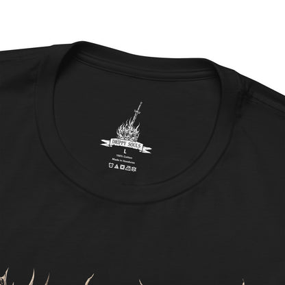 Folded T-shirt featuring Gravelord Nito from Dark Souls, the First of the Dead and lord of death itself. Shrouded in a cloak of bones and shadows, Nito commands miasma and disease, resting deep within the Tomb of the Giants. This design captures his skeletal majesty and the eerie calm of the lord who first brought death to the world.