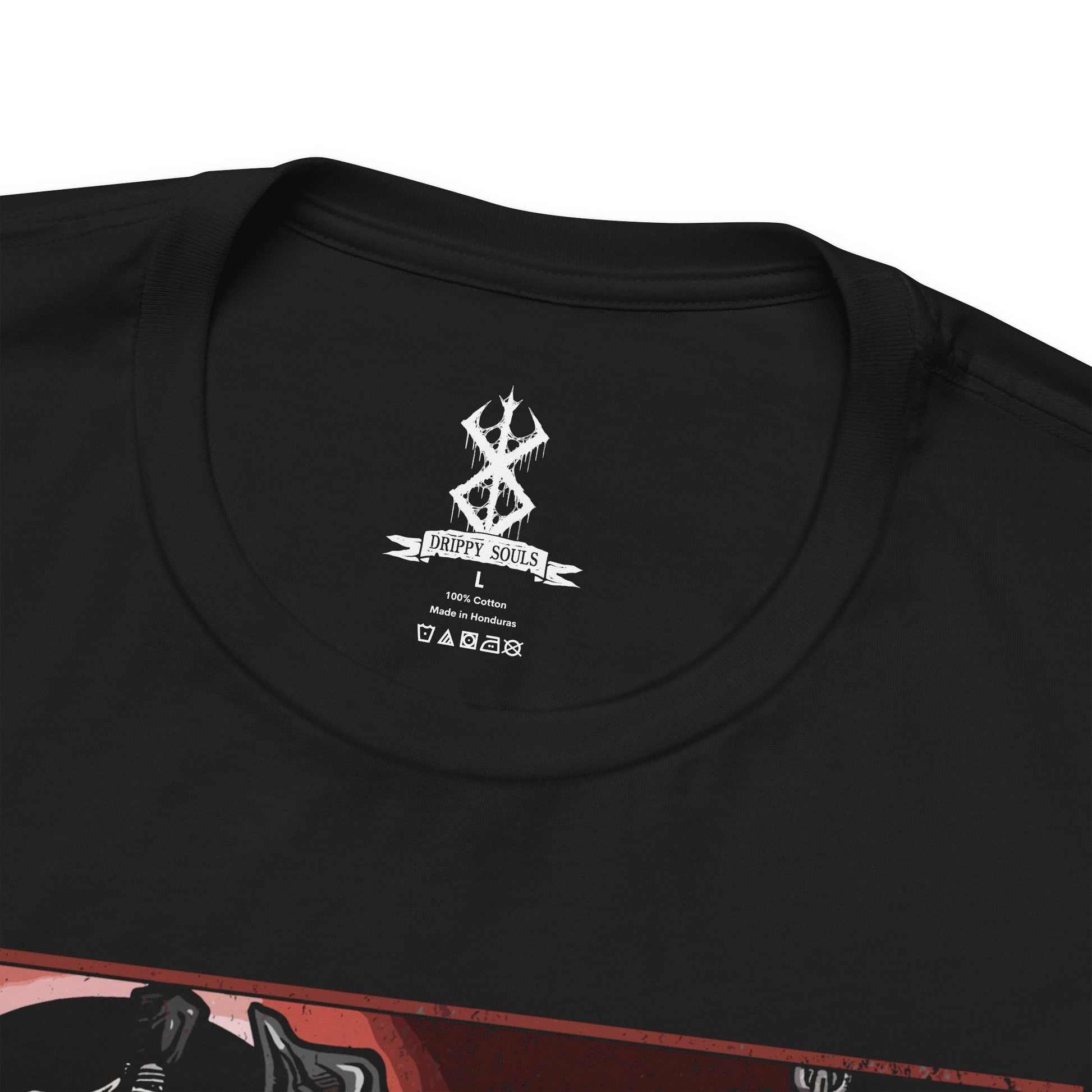 Folded T-shirt featuring Guts in a moment of pure, unrelenting rage from Berserk, the Black Swordsman consumed by vengeance and sorrow. With his iconic Dragonslayer sword in hand and his face twisted in fury, Guts channels the unyielding pain of his past battles. This design captures the raw, primal intensity of his journey, making it a must-have for fans of Berserk‘s dark, emotional storytelling and Guts’ struggle against insurmountable odds.