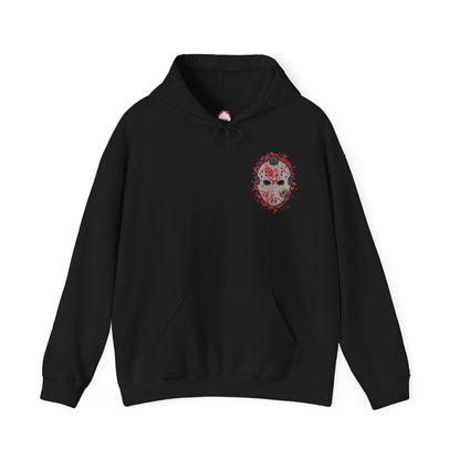 Image 4 of a Hooded Sweatshirt of Jason Voorhees walking through the forest surrounding Crystal Lake, machete in hand as shadows stretch between the trees. His worn hockey mask and silent presence create an atmosphere of dread. The composition emphasizes isolation, inevitability, and the chilling myth of a killer who always comes back.