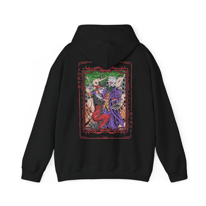 Image 5 of a Hooded Sweatshirt of the Joker and Harley Quinn seated atop a pile of stolen cash and broken carnival props beneath neon lights. Harley’s colorful outfit contrasts with the Joker’s eerie purple suit as confetti and smoke swirl through the air. The composition emphasizes comic-book chaos, psychological manipulation, and the unforgettable partnership between Gotham’s Clown Prince of Crime and his equally unpredictable accomplice.