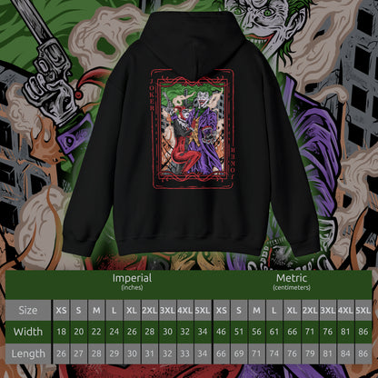 Size chart of a Hooded Sweatshirt of the Joker and Harley Quinn seated atop a pile of stolen cash and broken carnival props beneath neon lights. Harley’s colorful outfit contrasts with the Joker’s eerie purple suit as confetti and smoke swirl through the air. The composition emphasizes comic-book chaos, psychological manipulation, and the unforgettable partnership between Gotham’s Clown Prince of Crime and his equally unpredictable accomplice.