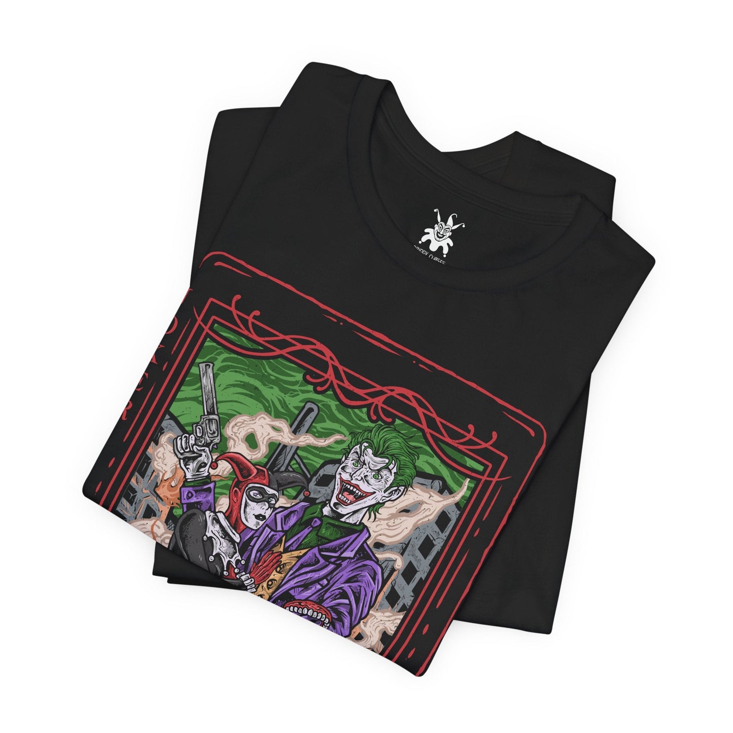 Image 5 of a T-Shirt design of the Joker and Harley Quinn from DC Comics, standing amid a rain-soaked Gotham alley as playing cards, graffiti, and chaotic laughter surround them. The Joker’s sinister grin contrasts with Harley’s mischievous smile as she twirls her oversized mallet. The design captures their unpredictable partnership, anarchic romance, and the dangerous chemistry that has made them one of comic history’s most iconic villain duos.