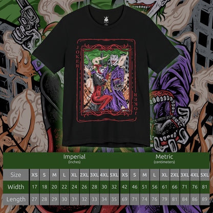 Size chart of a T-Shirt design of the Joker and Harley Quinn from DC Comics, standing amid a rain-soaked Gotham alley as playing cards, graffiti, and chaotic laughter surround them. The Joker’s sinister grin contrasts with Harley’s mischievous smile as she twirls her oversized mallet. The design captures their unpredictable partnership, anarchic romance, and the dangerous chemistry that has made them one of comic history’s most iconic villain duos.