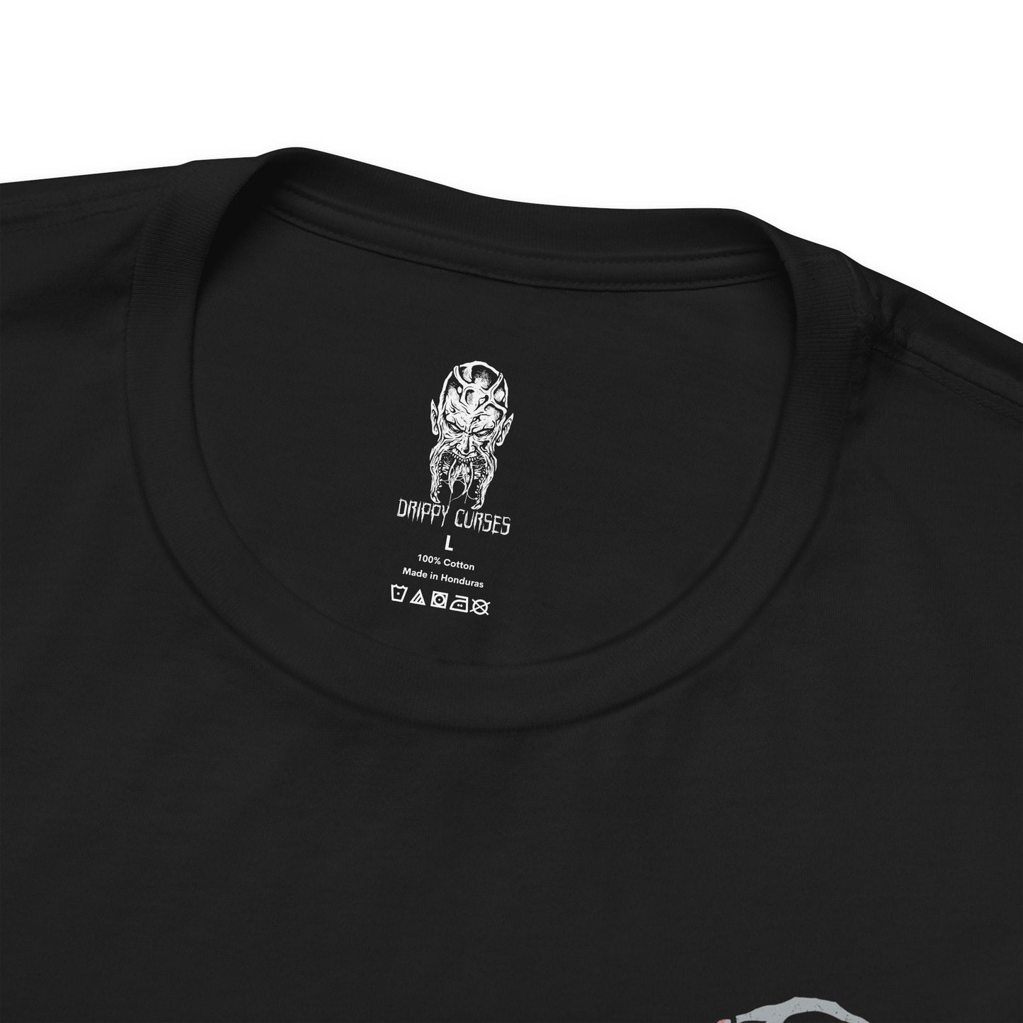 Folded T-shirt artwork depicting Kyle Crane mid-combat against Volatiles, leaping across rooftops as claws slash through the air behind him. Sparks from a UV flare illuminate their monstrous forms while the city skyline burns in the distance. This design reflects agility, desperation, and the brutal contrast between human endurance and the apex predators that dominate the night.
