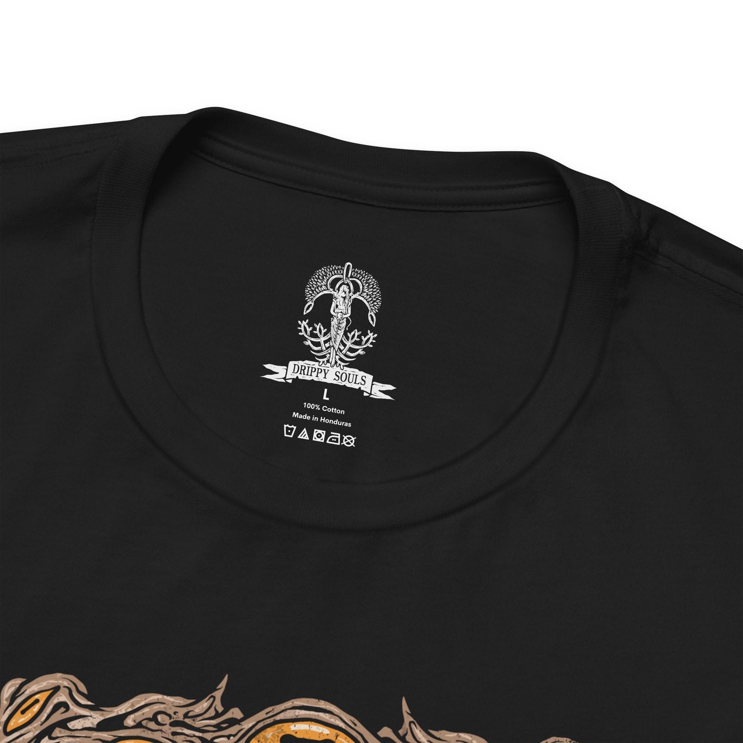 Folded Elden Ring Nightreign-inspired t-shirt design depicting Libra, the goat-headed demon who masquerades as a Scale-Bearing Merchant. The artwork highlights his cursed scales and twisted alchemy, offering Tarnished players deceptive bargains that grant power at the cost of sanity. His form echoes madness and balance, with counterfeit gold as the root of corruption.
