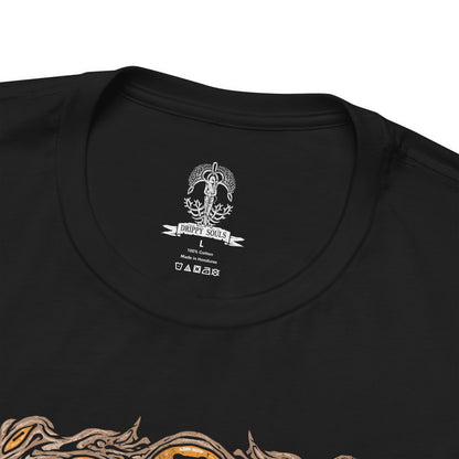 Folded Elden Ring Nightreign-inspired t-shirt design depicting Libra, the goat-headed demon who masquerades as a Scale-Bearing Merchant. The artwork highlights his cursed scales and twisted alchemy, offering Tarnished players deceptive bargains that grant power at the cost of sanity. His form echoes madness and balance, with counterfeit gold as the root of corruption.